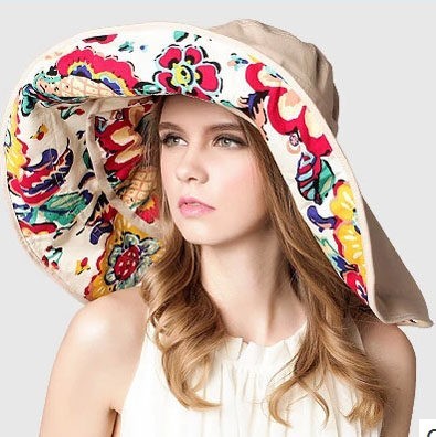 Light, sun-protective women's beach hat with wide brim - Cleofa