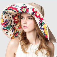 Light, sun-protective women's beach hat with wide brim - Cleofa
