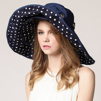 Light, sun-protective women's beach hat with wide brim - Cleofa