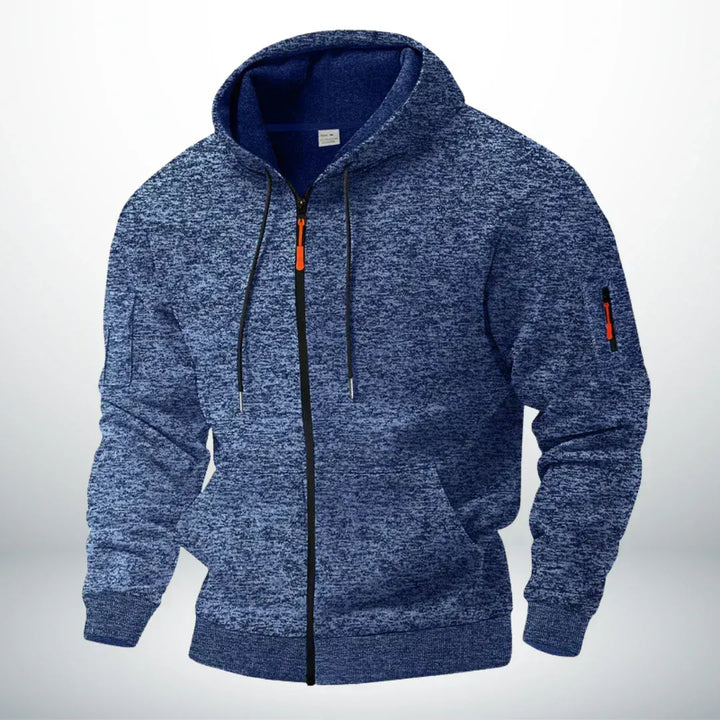 Gemêleerde blauwe vest-hoodie met rits, trekkoorden, voering van fleece en oranje ritstrekker, getoond op een lichte achtergrond. 1