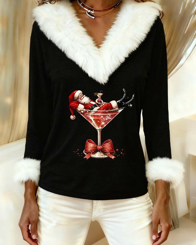 Close-up van de zwarte top met de glinsterende kerstman-in-cocktailglas print en pluche kraag 9