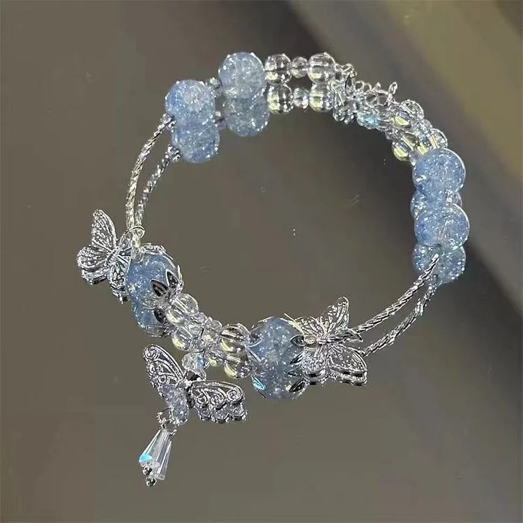 Hemelsblauwe Vlinderarmband met Bloemenmotief - Lila