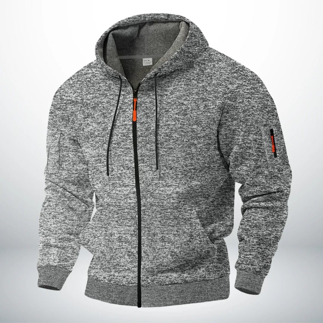 Hoodie in gemêleerd lichtgrijs met grijze binnenvoering, voorzien van capuchon, koordjes, voorzakken en een rits op de mouw. 3