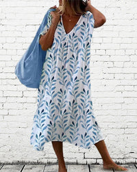 Trendy midi jurk met bladerenpatroon en V-hals – Nea