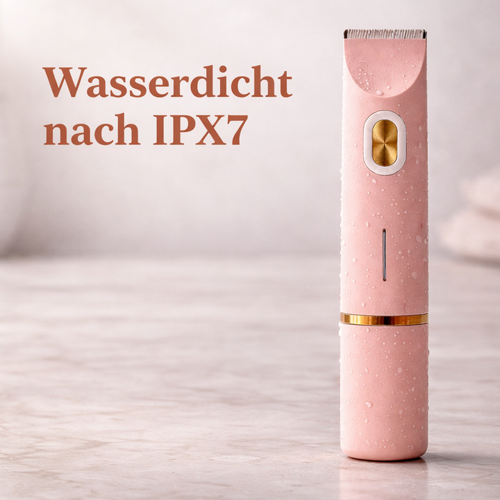 Roze trimmer rechtopstaand op een marmeren ondergrond, bedekt met waterdruppels om de waterbestendigheid te tonen. 11