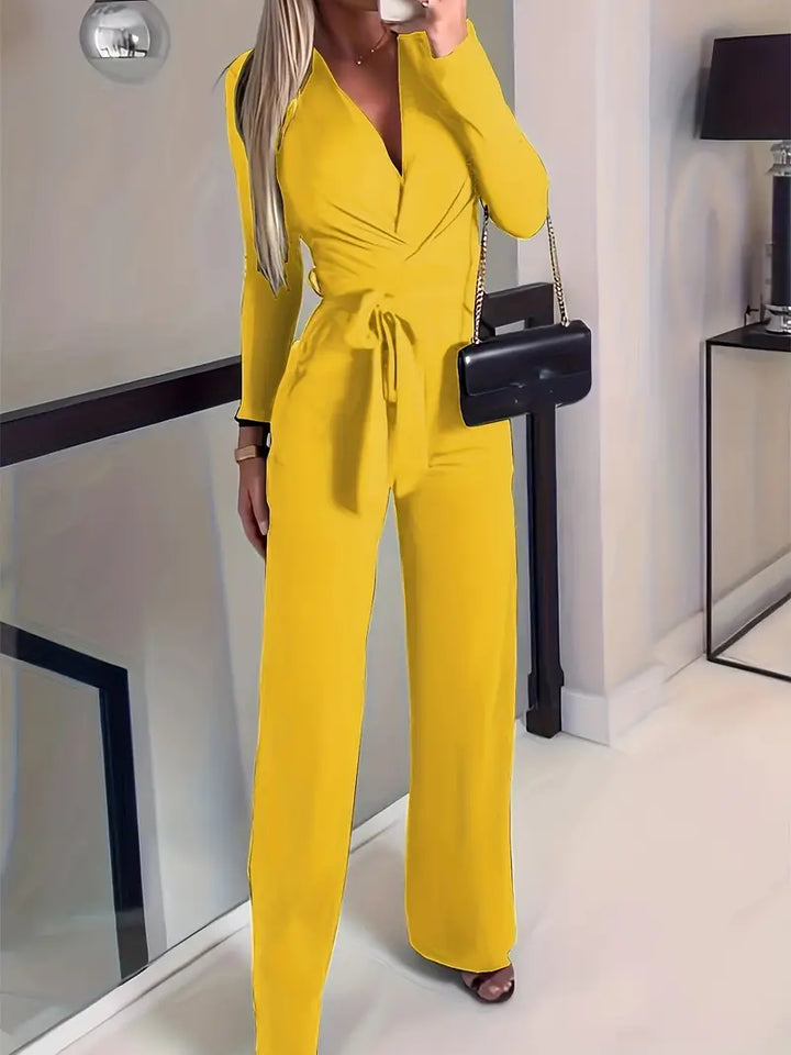 Wijd uitlopende jumpsuit met ceintuur en V-hals - Elise