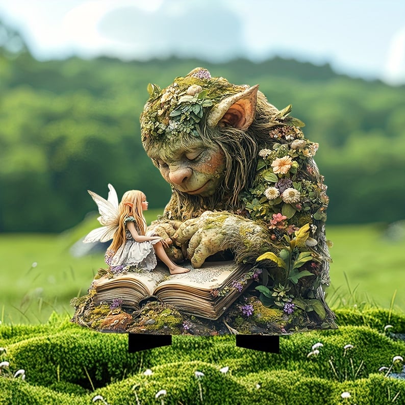 Slapende mosreus met bloemen op zijn lichaam en een kleine fee op een open boek, op een mosveld in de natuur. 2