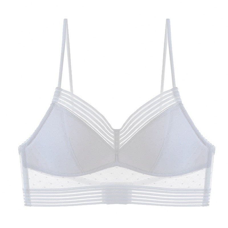 Losse witte bralette van voren met gestippeld mesh, gestreepte randen en dunne verstelbare bandjes. 9