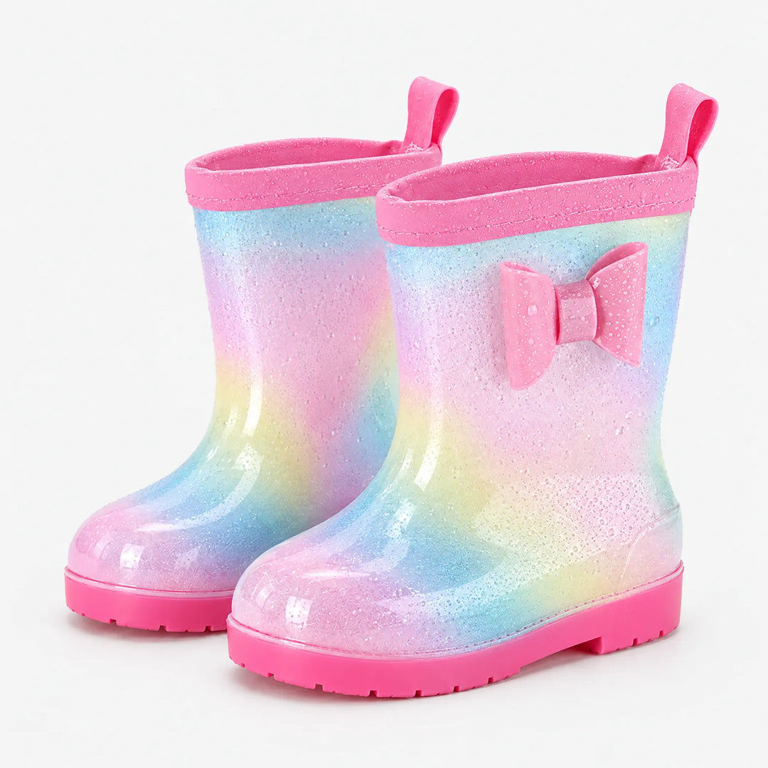 Paar pastelregenboogkleurige laarzen met glitterlook, waterdruppels, roze strik, roze rand, treklus en roze zool. 7