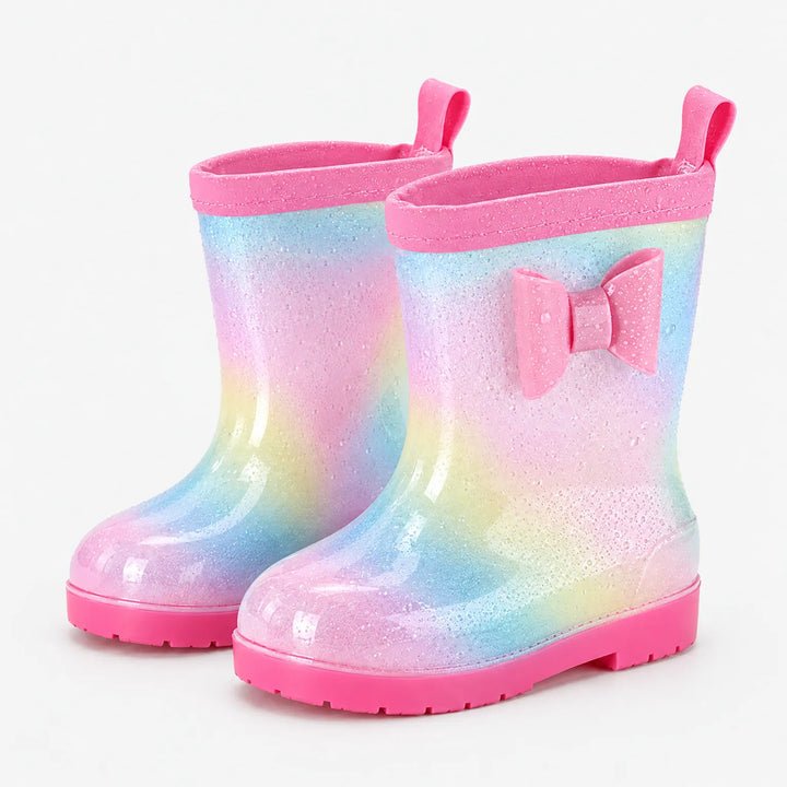 Paar pastelregenboogkleurige laarzen met glitterlook, waterdruppels, roze strik, roze rand, treklus en roze zool. 7