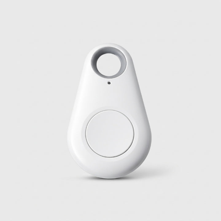 Witte druppelvormige tracker met sleutelgat en ronde knop, vooraanzicht op een lichte achtergrond 6