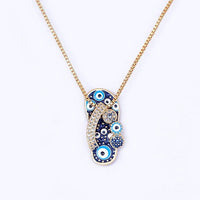 Gouden Ketting met Flip Flop Hanger en Boze Oog - Selma