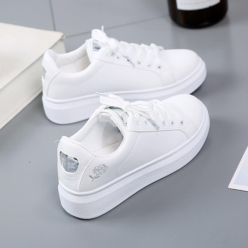 Trendy women's faux leather sneakers with metallic accents - Norell