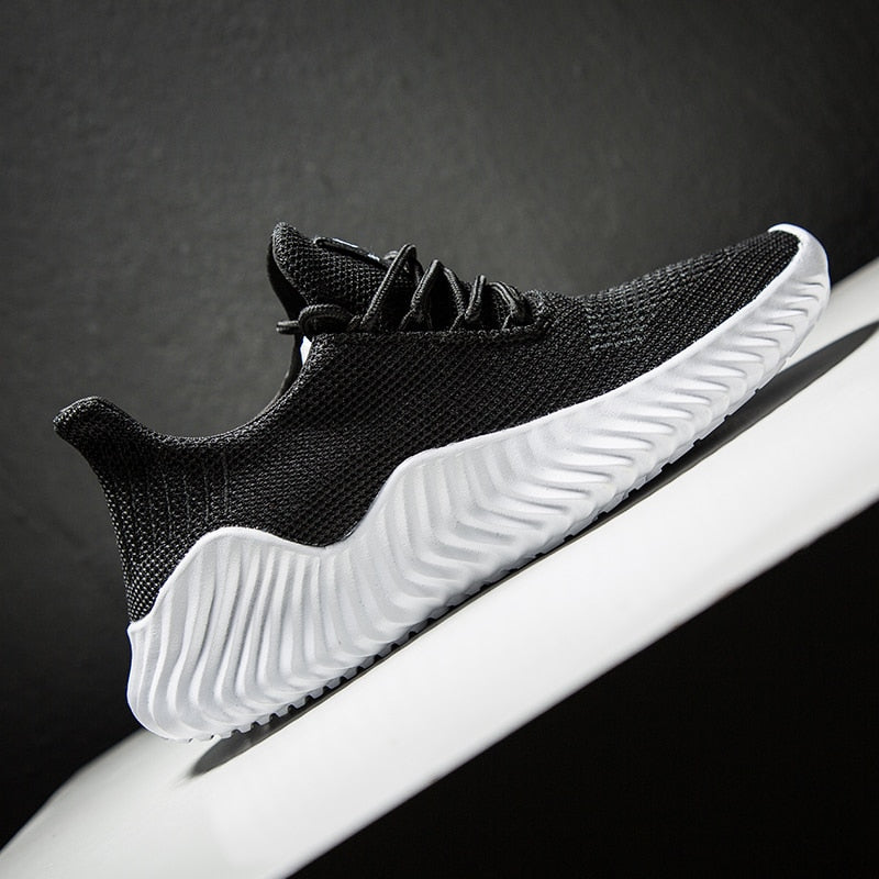 Ademende heren hardloopschoenen met mesh schacht – Niko