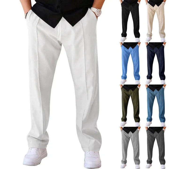 Witte broek gedragen met zwart overhemd en witte sneakers, plus kleine foto's van dezelfde broek in acht andere kleuren. 6