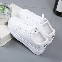 Trendy women's faux leather sneakers with metallic accents - Norell