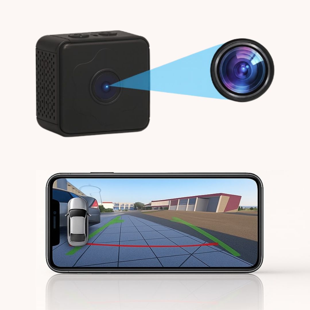 Zwarte kubusvormige camera met uitvergrote lens erboven en op een smartphone het achteruitrijbeeld met groene en rode hulplijnen. 2