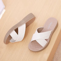 Women's wedge flip-flops made of synthetic leather with open toe area – Cassy