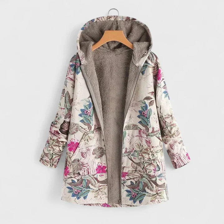Open parka op hanger met roze bloemen en blauwgroene bladeren op lichte stof, met zachte voering 2