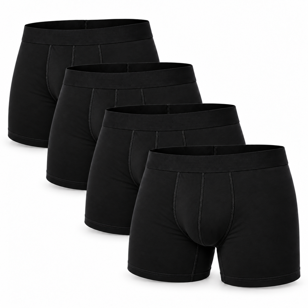 Set van vier zwarte boxershorts, gestapeld en iets verschoven, vooraanzicht met brede tailleband. 12