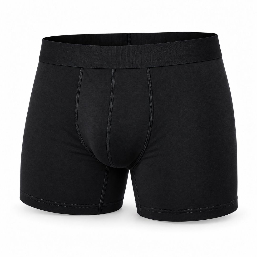Zwarte boxershort met langere pijp, vooraanzicht van één exemplaar met zichtbare naden en brede tailleband. 13