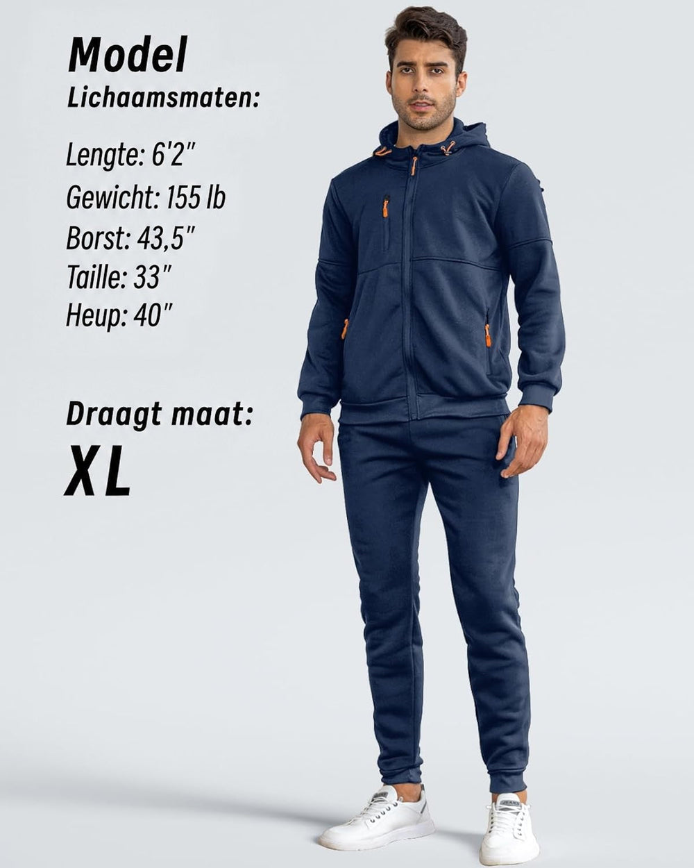 Model draagt het marineblauwe trainingspak met capuchon en oranje details, frontaal, met maataanduiding en lichaamsmaten 2