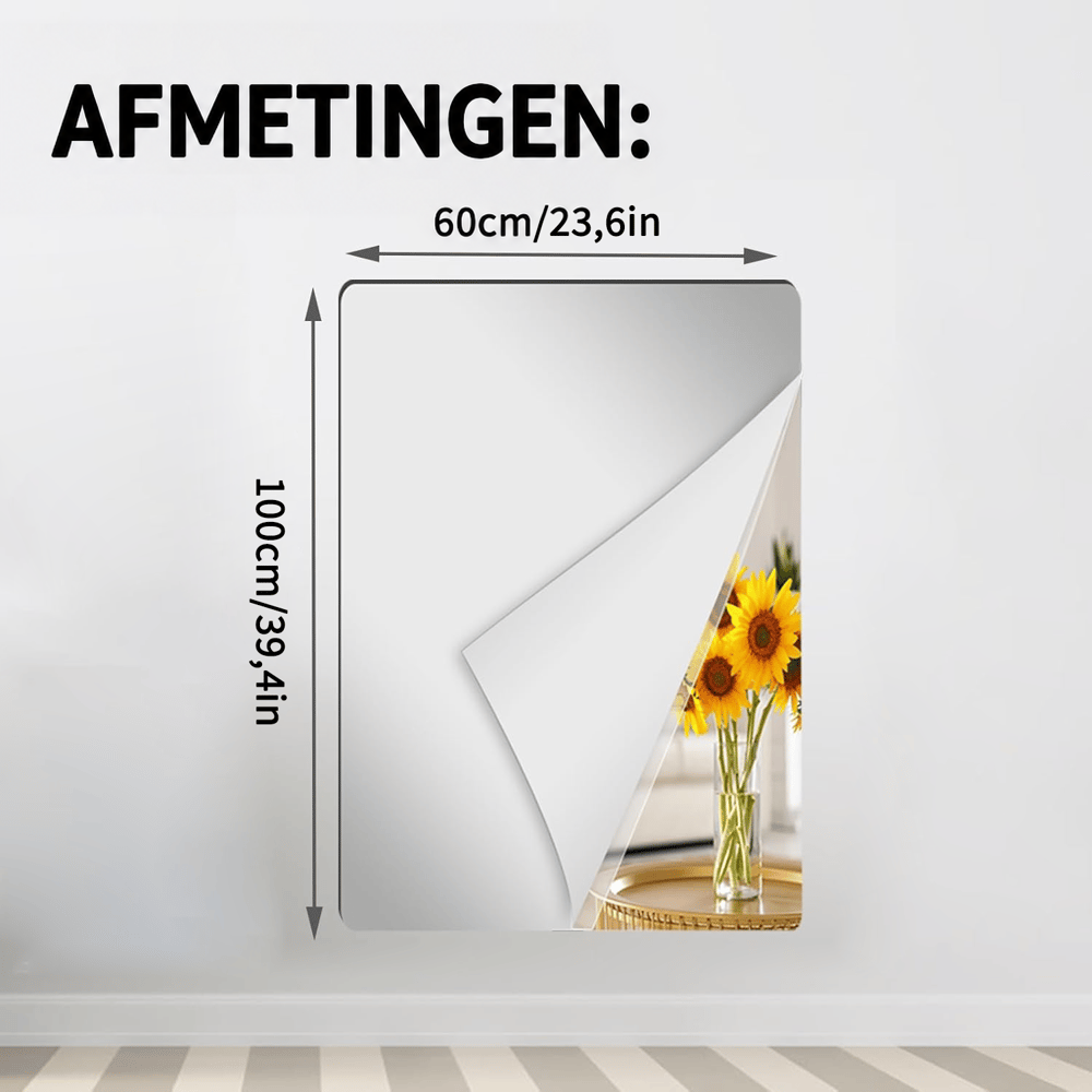 Rechthoekige spiegelplaat in een bredere uitvoering op een witte muur met een omgekruld hoekje en zonnebloemen, met maataanduiding. 14