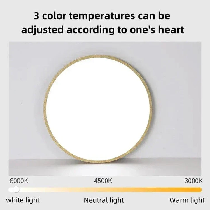 Lamp met lichte houtrand en witte diffuser, met een schaal van wit tot warm licht voor drie instelbare kleurtemperaturen. 18