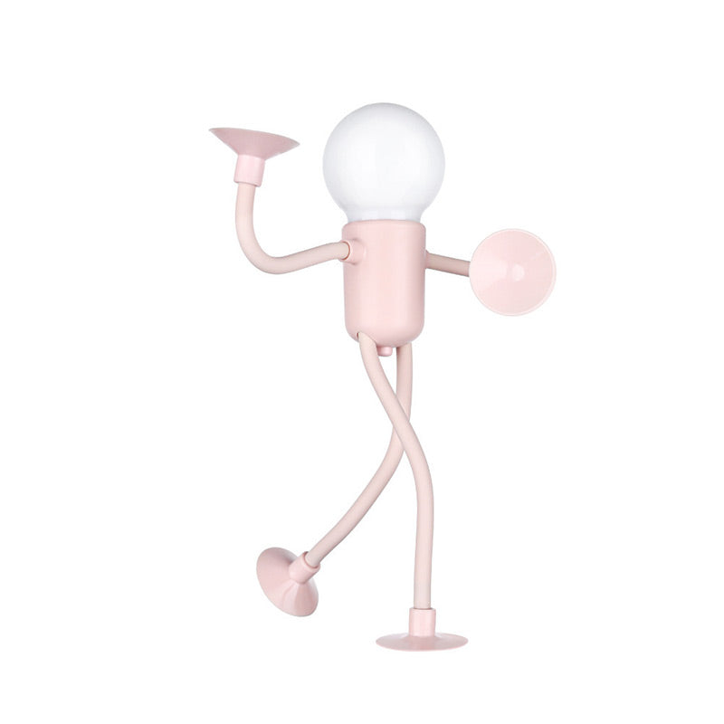 Roze mannetjeslampje met bolle lamp en buigbare ledematen met zuignappen, de ene arm omhoog en een been naar achteren gebogen. 3