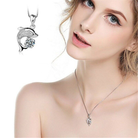 Naszyjnik z kryształami z zawieszką delfina | Amulet szczęścia na łańcuszku!