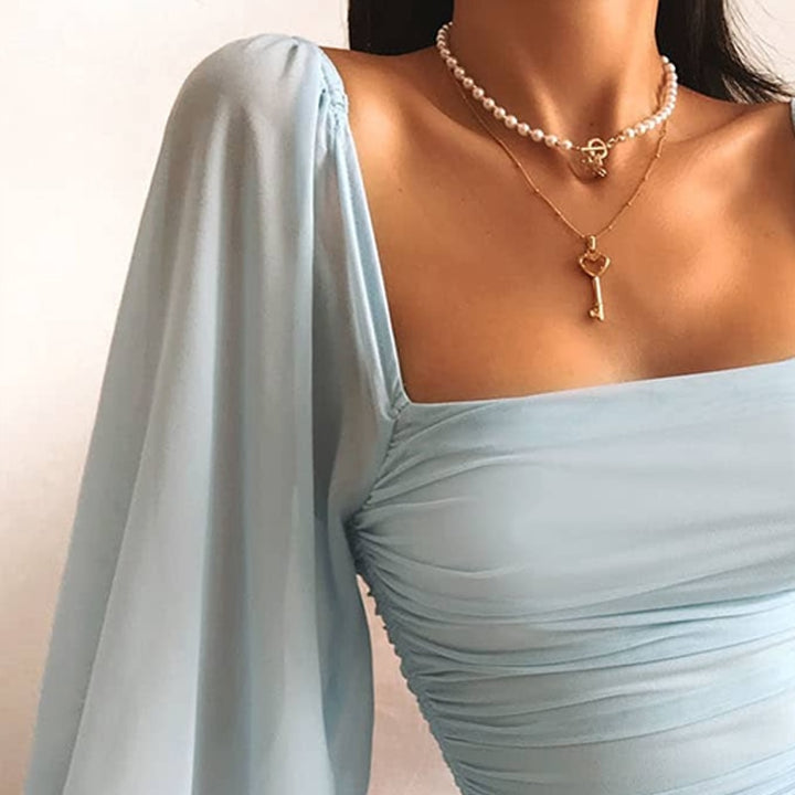 Sammy Jackson™ Fiona Party Dress with Batwing Sleeves | Elegant & Sexy
